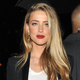 Image for article titled Amber Heard's Legal Team: She 'Is Simply a Victim of Domestic Violence'